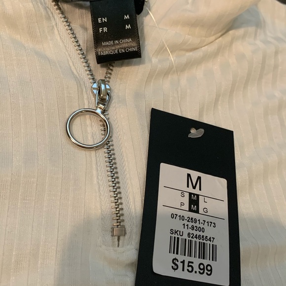 Super cute white long sleeve. - Picture 3 of 4